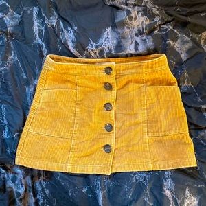 Adorable yellow corduroy short skirt with pockets